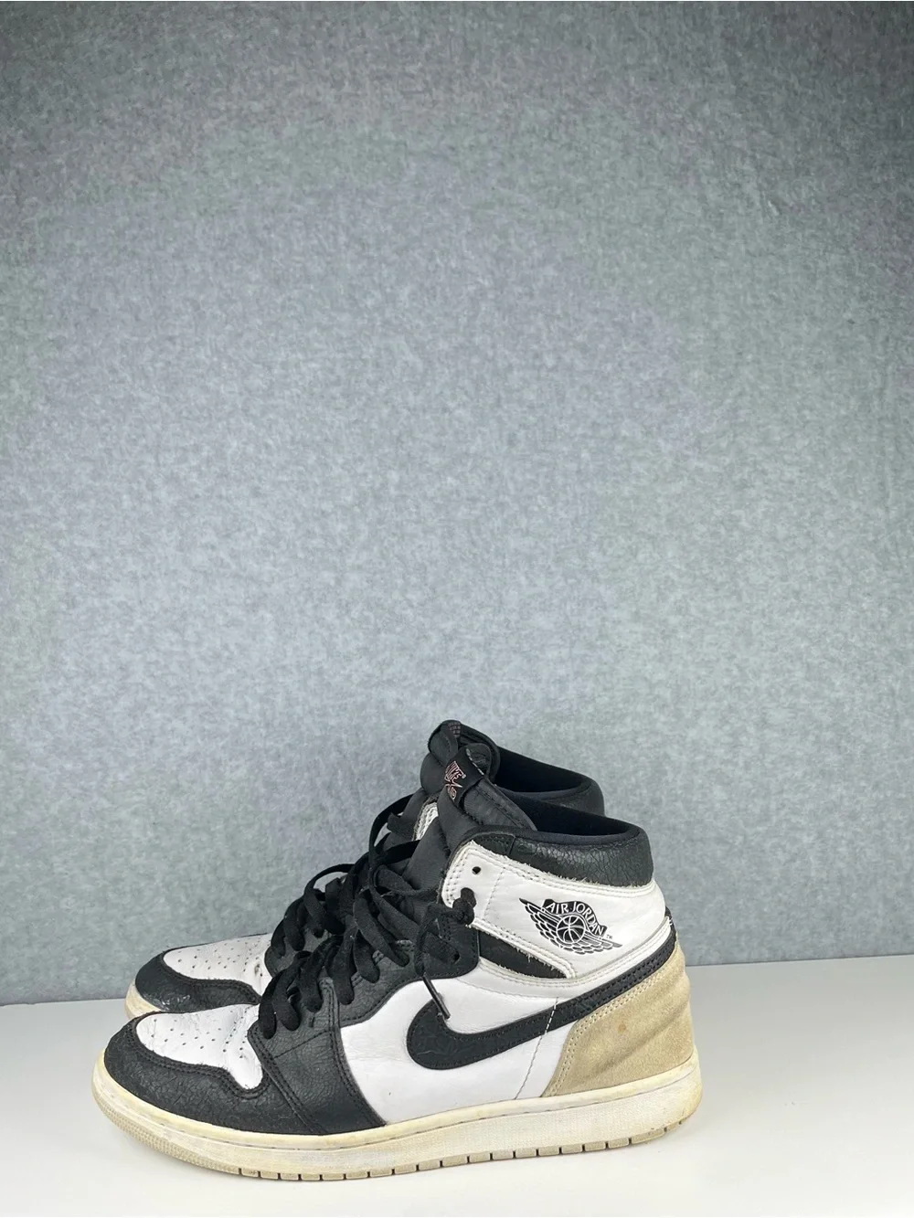 Nike Black and White High-Top Sneakers with Pink Logo